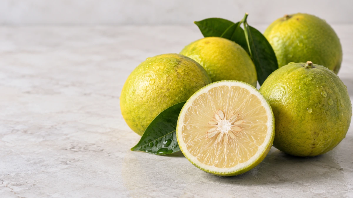 Whole and cut sweet lime known as mitha fruit in Pakistan